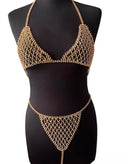 Lingerie bijou CRISTAL en strass doré pour femme, éclat lumineux et design précieux inspiré de la haute couture, silhouette sublimée avec une esthétique raffinée et moderne 