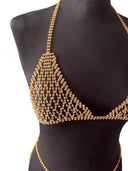 Ensemble lingerie CRISTAL doré effet bijou avec strass scintillants, création lumineuse et élégante qui transforme la silhouette en une pièce couture sophistiquée